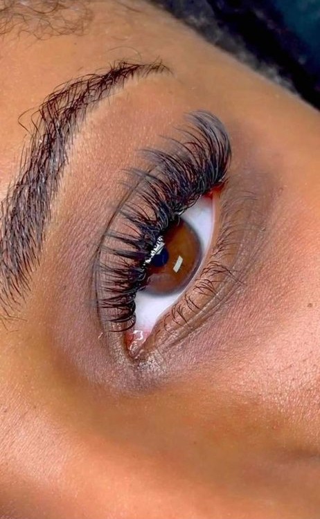 Close-up of a finished lash set with a full, fluttery look