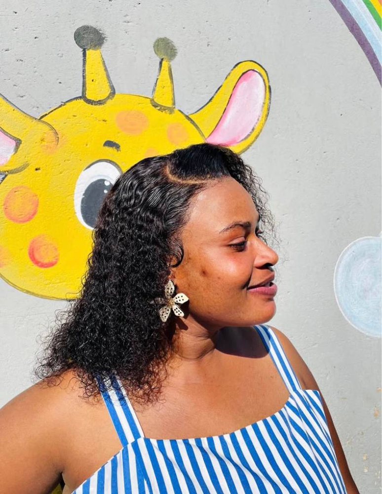 Natural curly hairstyle with defined texture